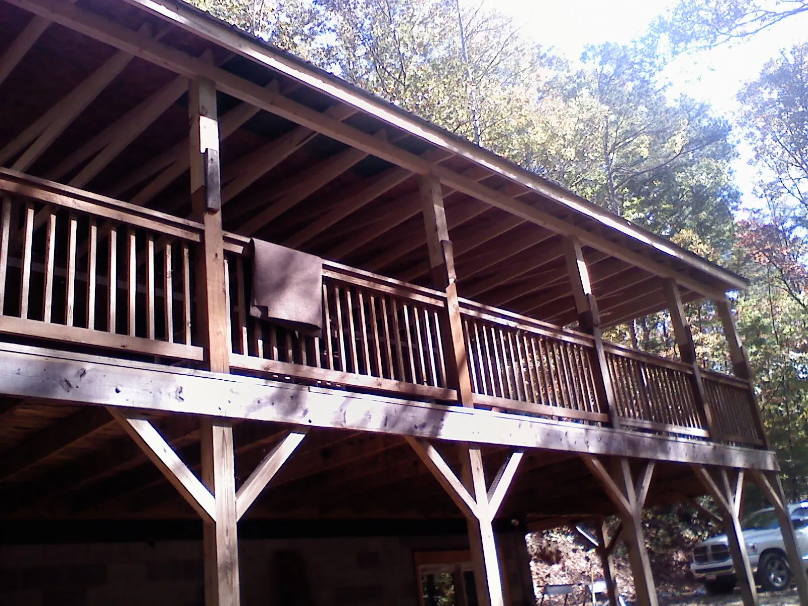 Timber framing under a new elevated porch and deck — Roof Leak Repair in Elbridge by Roofing Brothers